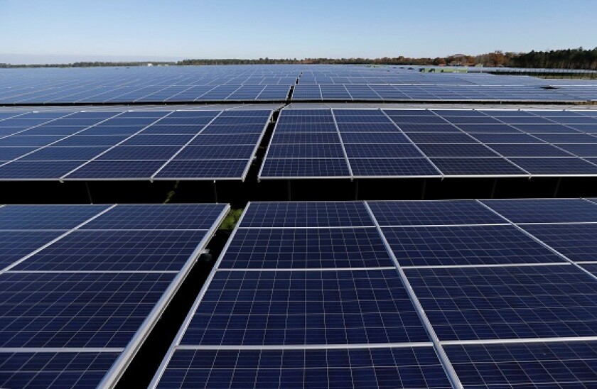 File photo shows a general view of solar panels used to produce renewable energy at the photovoltaic park, the biggest in Europe, during its official inauguration in Cestas, France, December 1, 2015. REUTERS/Regis Duvignau/File Photo