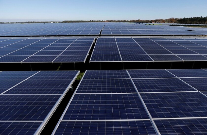 File photo shows a general view of solar panels used to produce renewable energy at the photovoltaic park, the biggest in Europe, during its official inauguration in Cestas, France, December 1, 2015.  REUTERS/Regis Duvignau/File Photo