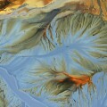 Aerial view of copper mining residuals in decanting lake by drone