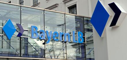 FILE - In this Dec. 1, 2008 file photo, the company logo of the BayernLB bank is seen at the headquarters in Munich, southern Germany. Prosecutors searched the offices of German bank BayernLB on Wednesday Oct. 14, 2009, as part of an investigation of a fo