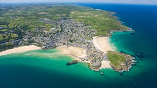 Aerial view of coastline of St Ives in summer sun Cornwall England UK United Kingdom GB