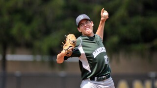 Sport Baseball Pitcher delivering a curve ball. Carol Stream, Illinois, USA.