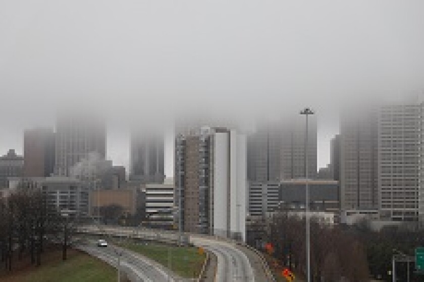 Atlanta skyline skyscrapers in fog clouds from Adobe 230x150.jpg