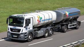 FrieslandCampina MAN TGS milk truck on German motorway.