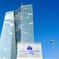 Low angle view of the sign of the European Central Bank at the entrance of the Skytower building in Frankfurt, Germany, seat of the ECB since 2015.