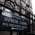 Sign at entrance to Parliament Square and the Supreme Courts ( Court of Session) in Edinburgh Old Town, Scotland, UK