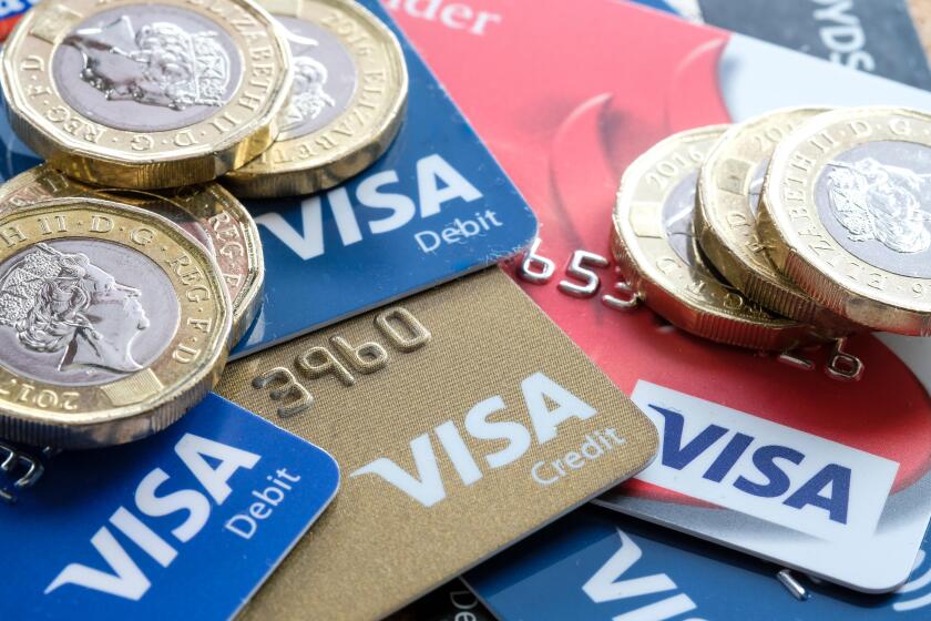 Visa Debit and Credit Cards with new Pound Coins