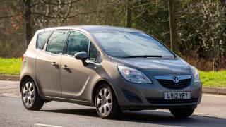 Milton Keynes,UK-Mar 4th 2024: 2012 Vauxhall Meriva diesel engine car driving on an English road