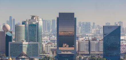 UAE, Dubai, Deira. Hilton Hotel, Emirates NBD bank and Dubai Chamber of Commerce buildings, elevated view