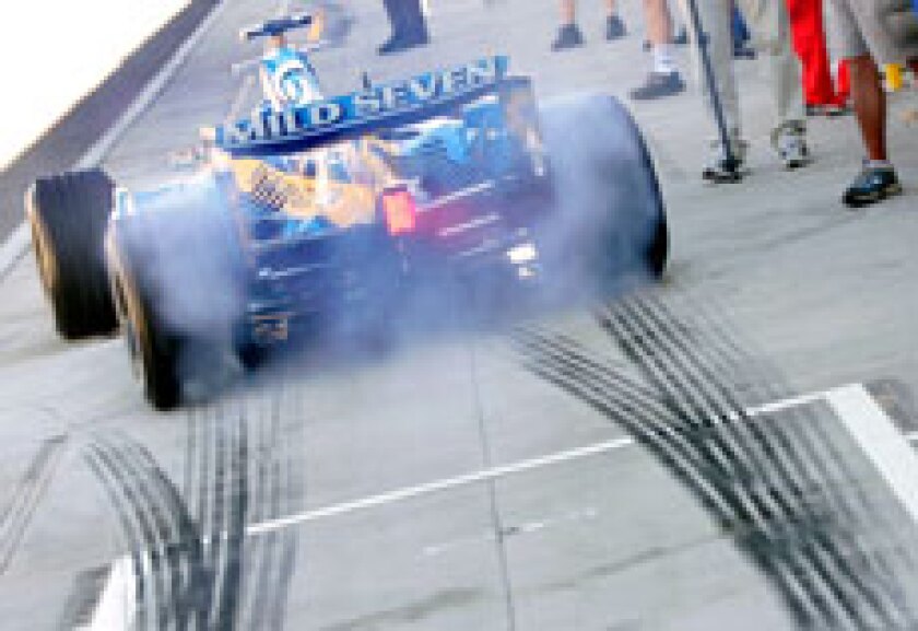 Race car burning rubber