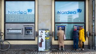People using Nordea Bank ATM machines in Copenhagen, Denmark, Europe