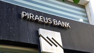 Greek Piraeus Bank building along 25is Avgoustou, Heraklion, Crete, Greece, Europe.