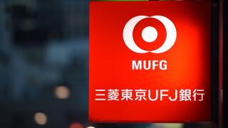 A signboard of the Bank of Tokyo-Mitsubishi UFJ is seen on January 14, 2016 in Tokyo, Japan. Mitsubishi UFJ Financial Group Inc., Japans biggest bank, agreed to buy a 20 percent stake in Philippine lender Security Bank Corp. for the equivalent of $773 mil