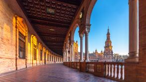 Plaza de Espana Seville Spain Sevilla, at sunset. View towards the South tower of the main building.