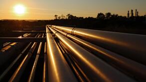 golden steel pipeline system during sunset