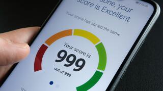 Stafford / United Kingdom - September 27 2020: Experian Credit Score report seen in the smartphone screen with the highest possible number. Real photo