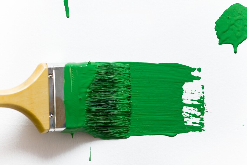 Green paint and brush