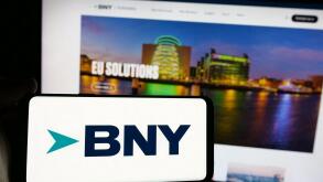 Stuttgart, Germany - 01-30-2025: Person holding smartphone with logo of company The Bank of New York Mellon Corporation (BNY) on screen