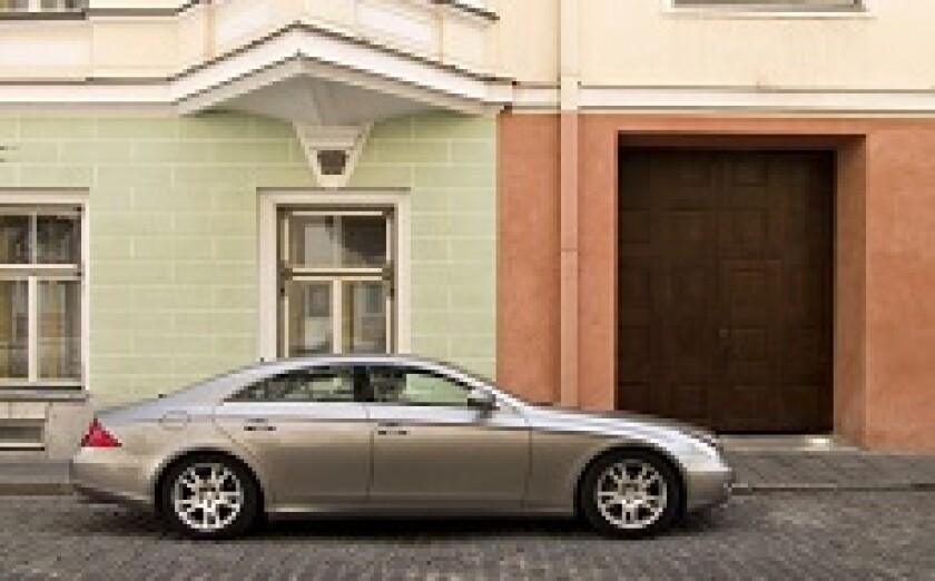 Mercedes Outside A House