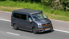 2016 grey VW Volkswagen Transporter T30 T-Ln Tdi Bmt LCV diesel panel van, driving on the M6 motorway near Preston in Lancashire, UK.