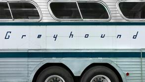 Historic greyhound bus with logo on side