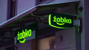 A picture of two Zabka logos in front of a store.