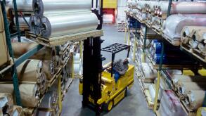 Forklift working in a large distribution warehouse