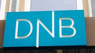 Trondheim, Norway - September 26, 2015: Close-up of the sign at the DNB office entrance. DNB is a Norwegian financial services group.