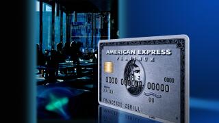 Close up of American Express card against composite background