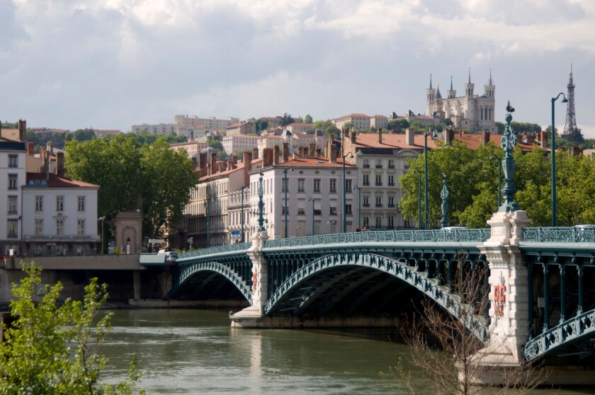 The Pont de l'Universite over the River Rhone and the Lyon skyline, Lyon, France