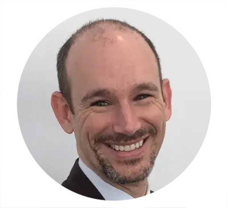 Scott Carpinteri headshot circle.jpg