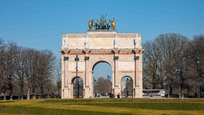 Arc de Triomphe du Carrousel on a sunny spring day in Place du Carrousel, Paris, France
