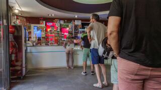 People Queue At Tobacco Shop For Cigarette Purchase. Spanish Estanco Store, Customer Line, Tobacco Sales, Retail Business, Consumer Behavior, Shopping