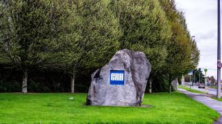 The sign for CRH, Cement Roadstone  Holdings outside their offices in Belgard  Road, Dublin, Ireland.