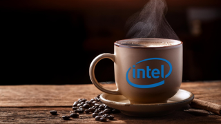 A hot mug of coffee with Intel's logo affixed to the side of the cup