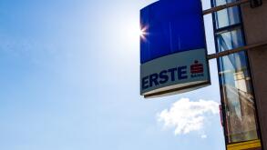 Erste Bank trade sign logo backlit against blue sky