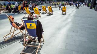 Aviva PLc HQ Headquarters London . Aviva sponsored deck chairs outside the Aviva St Helen's bldg, formerly Aviva Tower, St Mary Axe, City of London.