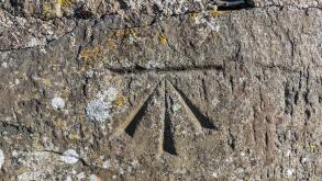 Old surveyors benchmark in stone structure