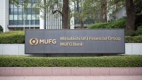 MUFG - Mitsubishi UFJ Financial Group Company sign in front of the Head office in Chiyoda City.