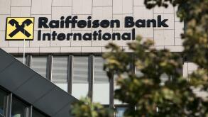 A logo sign outside of the headquarters of Raiffeisen Bank International (RBI) in Vienna, Austria, on September 5, 2018. (Photo by Kristoffer Tripplaar/Sipa USA)