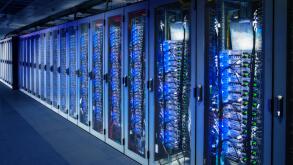 Network cabinets with server racks in a data center. Digital Composite (DC)