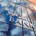 World Bank on glass building. Mirrored sky and city modern facade. Global capital, business, finance, economy, banking and money concept 3D rendering