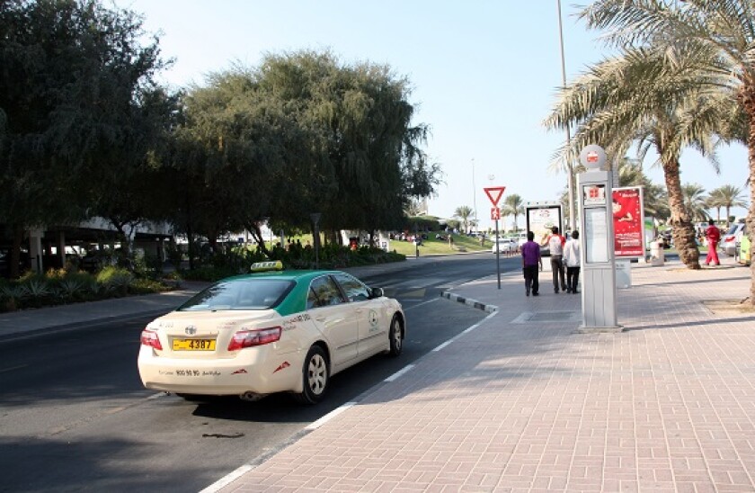 Dubai Taxi at a bustop in Burdubai, UAE