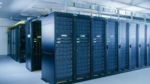 Shot of Data Center With Multiple Rows of Fully Operational Server Racks. Modern Telecommunications, Cloud Computing, Artificial Intelligence