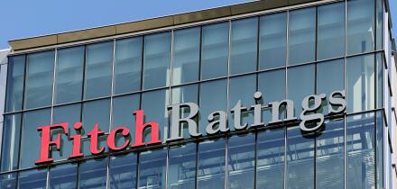 Fitch Ratings Sign on its Office Building, Canary Wharf, London, UK.