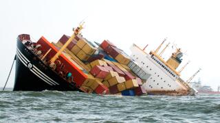 Container ship sinking tilted dangerously after colliding accident in Arabian Sea Bombay Mumbai Maharashtra India Asia Indian accident Asian