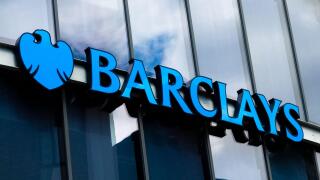 Barclays blue sign on a bank window in Newcastle.