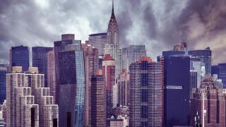 Manhattan skyline on a cloudy day, vintage color toning applied, New York City, USA.