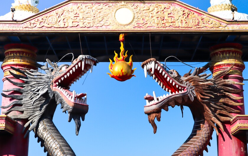 statue of 2 dragons 1 big fireball-adobe-2022