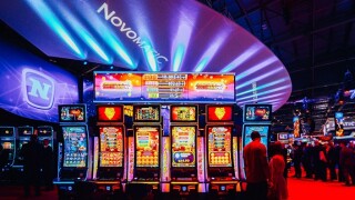 Novomatic at ICE exhibition 2019 from Alamy 21Feb22 575x375